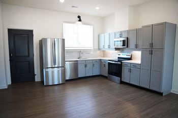 Open-concept kitchen at Wesley Place Apartments in Birmingham, AL
